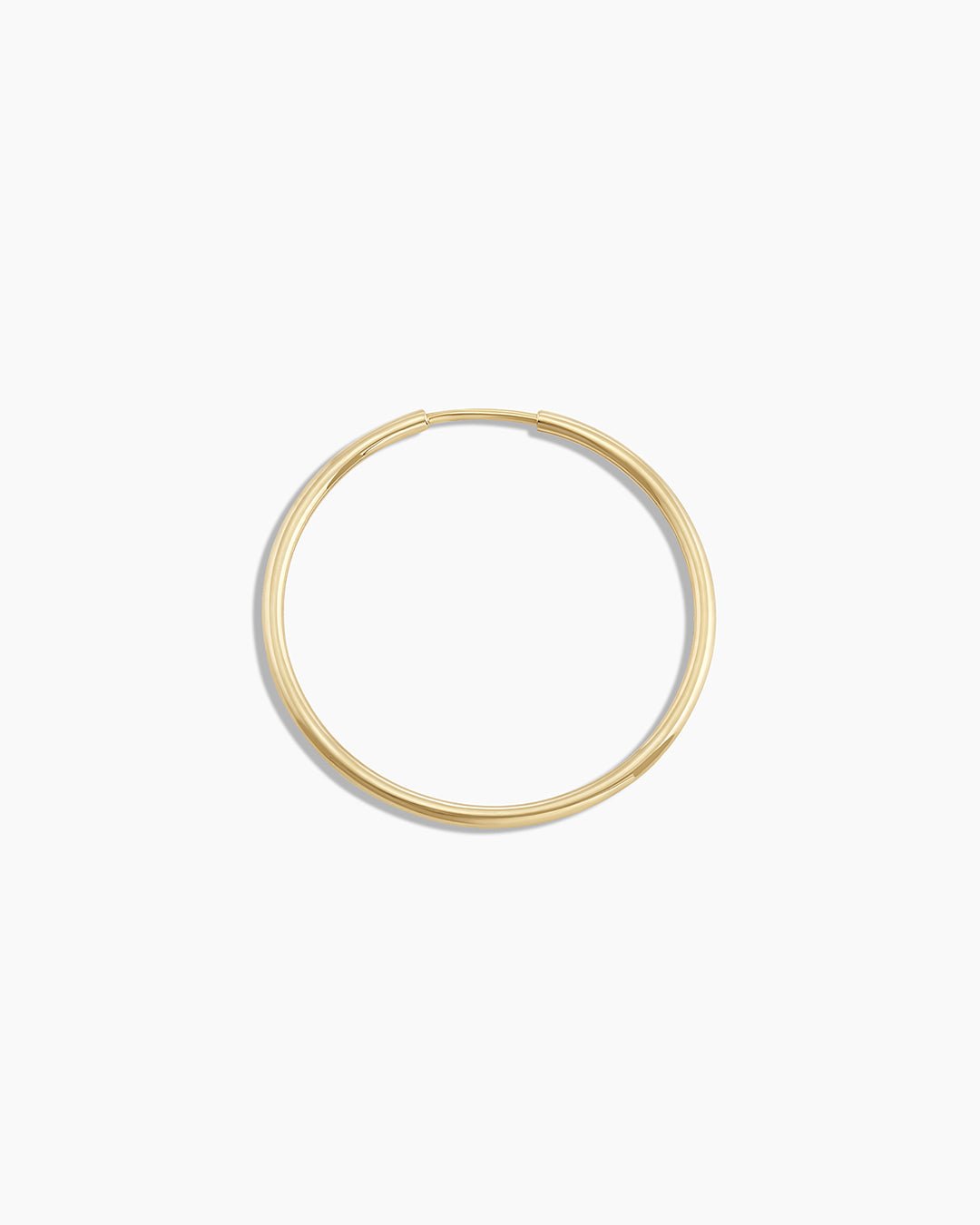 Woman wearing Classic Gold Hoop || option::14k Solid Gold, 22mm