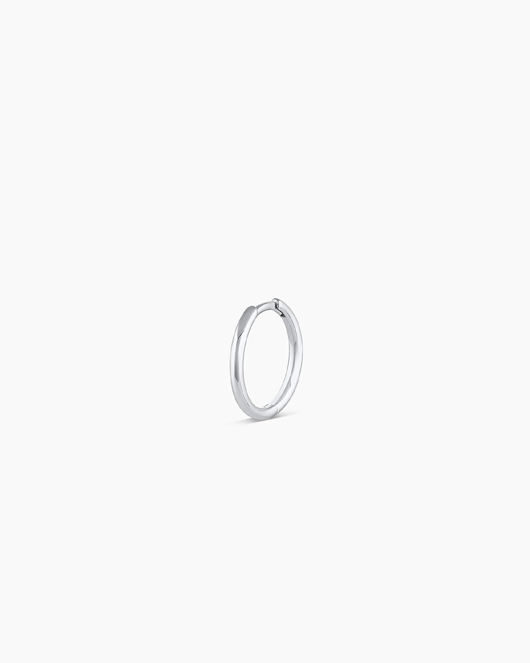 Woman wearing Classic Gold Huggie || option::14k Solid White Gold, 11mm